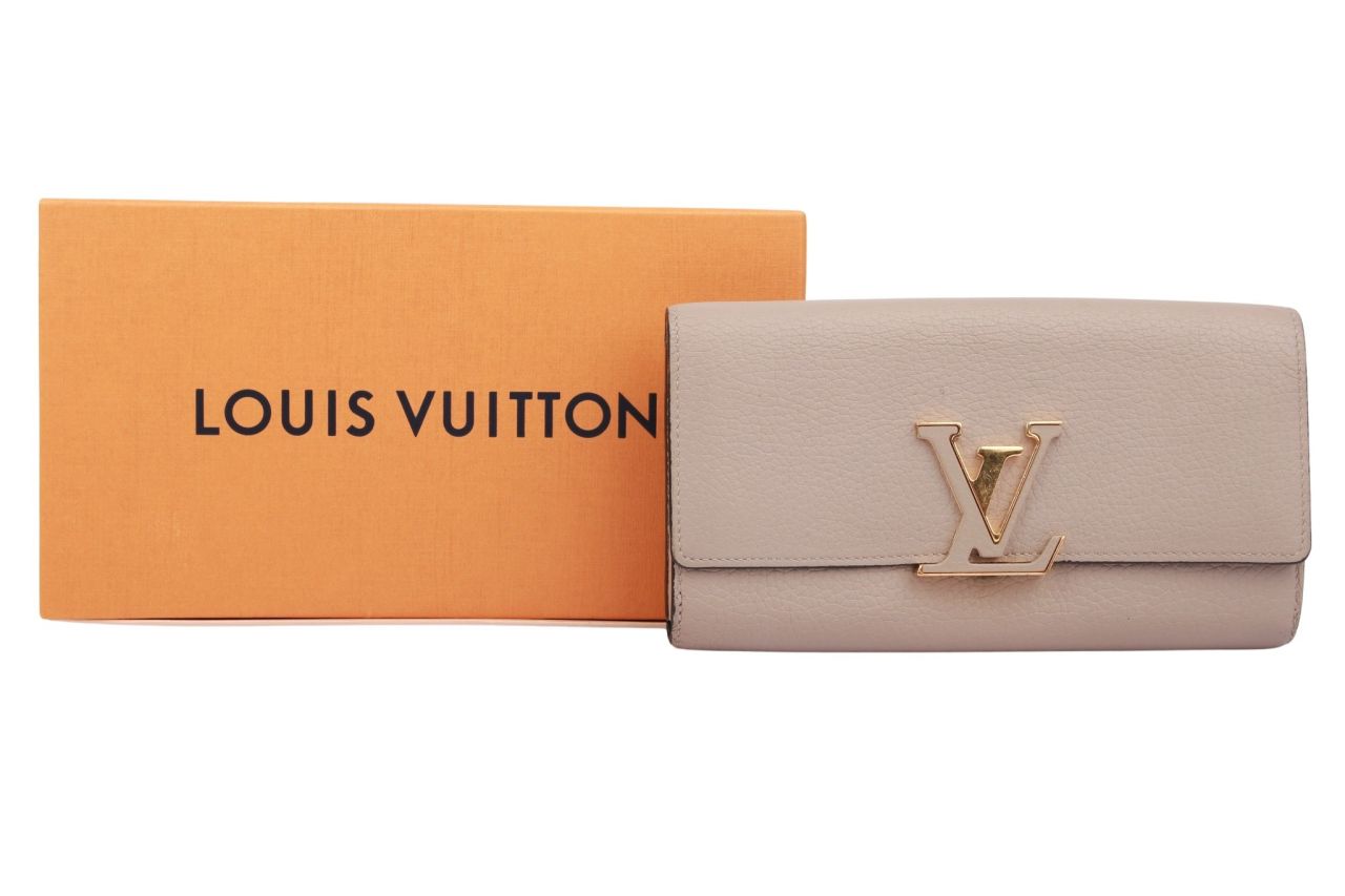 Louis Vuitton Capucines Portemonnaie Leder Beige